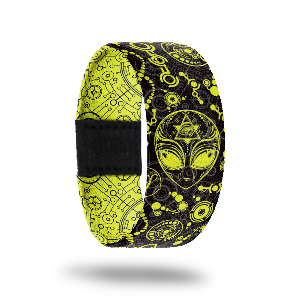 Alien-Sold Out-ZOX - This item is sold out and will not be restocked. Black base with neon yellow drawings of an alien head, circles, dots, lines and eyes. The inside is the reverse colors and reads Alien. 