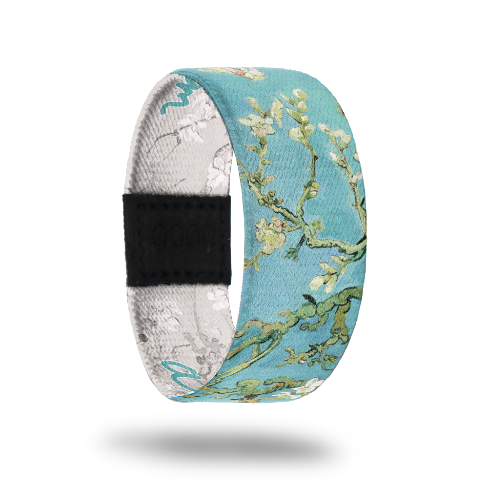 Almond Blossom-Sold Out-ZOX - This item is sold out and will not be restocked. Light blue sky with white Cherry Blossoms. Inside is the same monochromatic grey and white and reads Almond Blossom. 