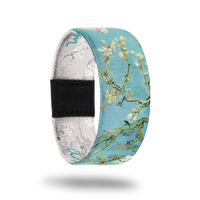 Almond Blossom-Sold Out-ZOX - This item is sold out and will not be restocked. Light blue sky with white Cherry Blossoms. Inside is the same monochromatic grey and white and reads Almond Blossom. 