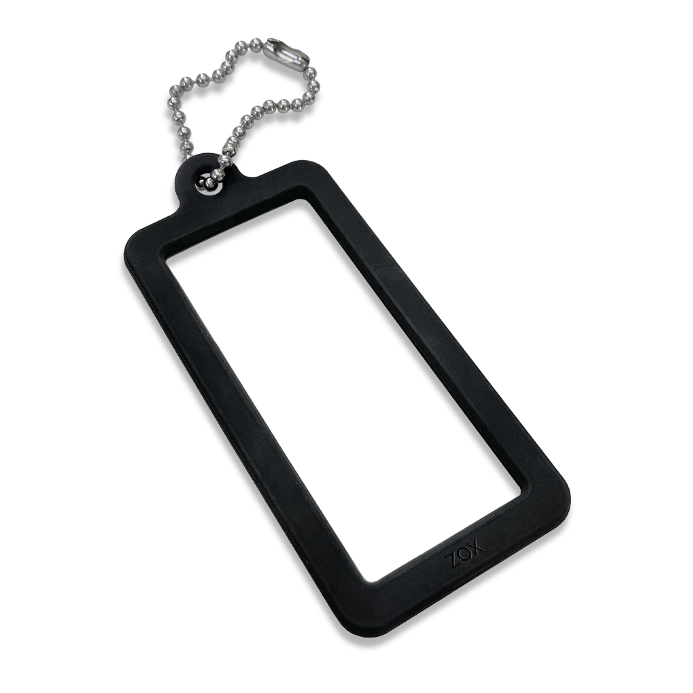 This is a cardlox. It is a silicone black rectangle with a clear poly sleeve to store the motivational card that comes with your ZOX. It has a metal key ring on the end to use for backpacks, keys, luggage, etc. The pack comes with 2. 