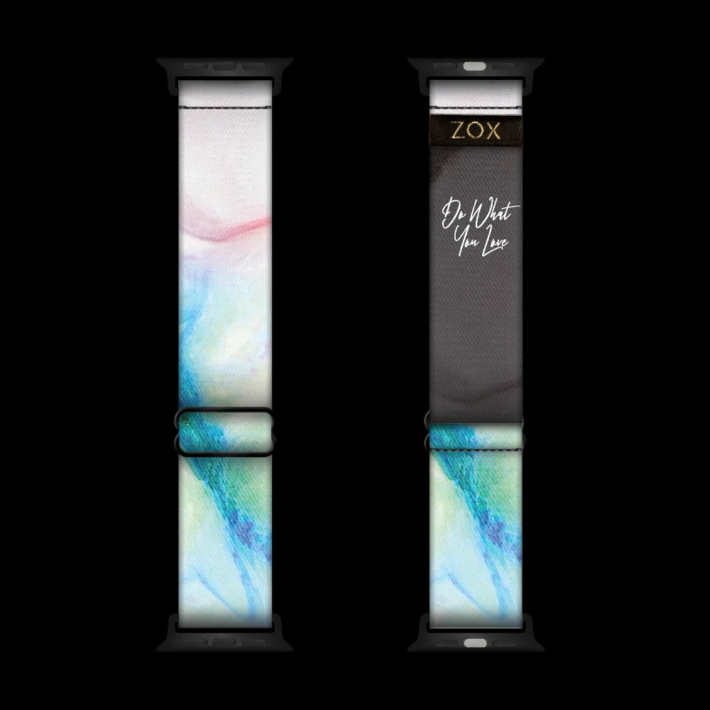 ZOX watchband with a marbled design. Mostly white with some light pink, teal and blue swirls. Inside is the same and says Do What You Love but is not reversible. Check the size guide for compatible watches. 