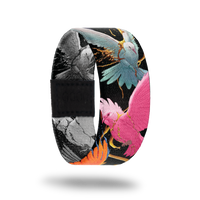 Outside Design of Excelsior: black background with bright colored birds and branches