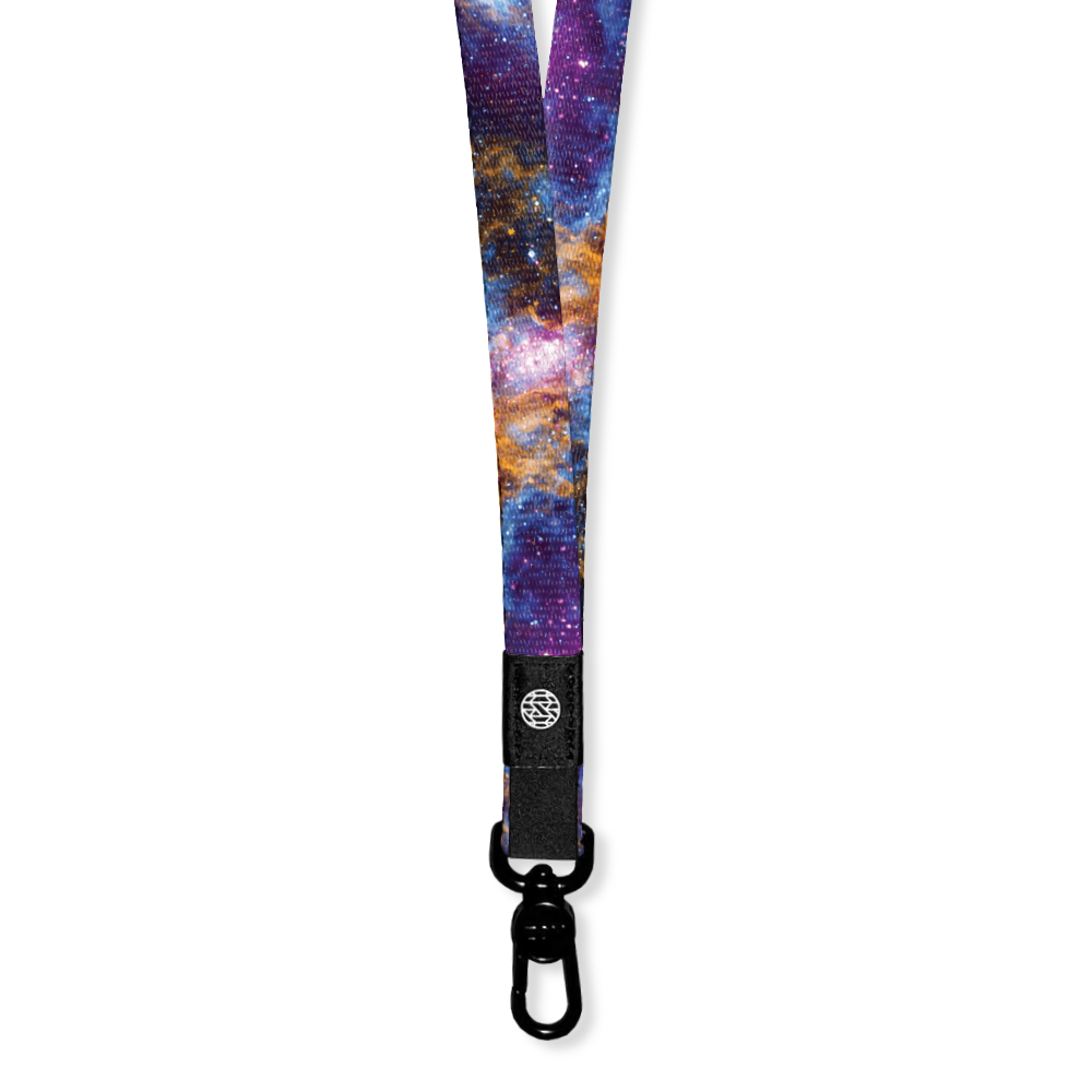 A nebula scene from space with purple, blue, orange, pink and white speckles. Inside is solid black and says Fighter