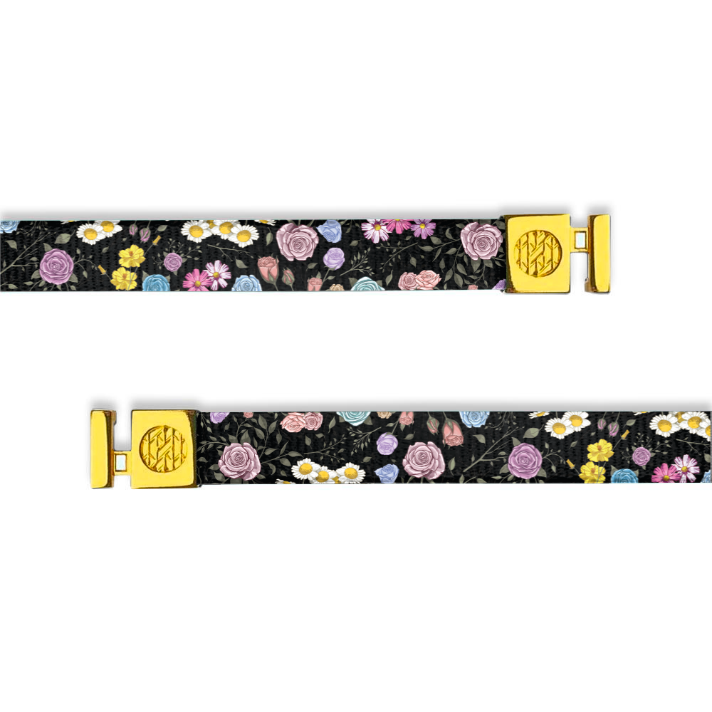 Flat hoodie string. Design is a black background with pink, blue and purple flowers and daisies. Inside reads "In a Field of Roses" and aglets are gold. 