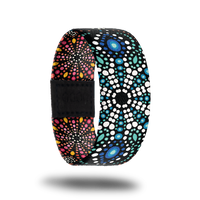 Outside design of Be Kind is of dot art in a mandala style in white, green, blue, pink, and yellow dots