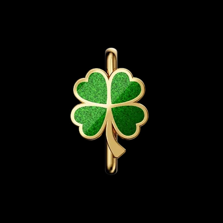 This is a charm that fits ZOX single wristbands, lanyards and hoodie strings only. It is made from stainless steel and is gold in color. It has a bright green shamrock in the center.