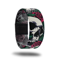 Outside design for Memento Mori. Illustrated realistic white skulls with red roses and green leafs