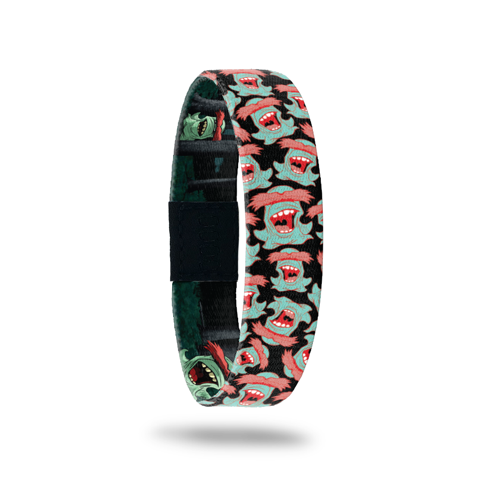 Product photo of the outside of 2020 - Day 11 - Mr. Uh Huh: black design with repeating mint green monster with red eyebrows