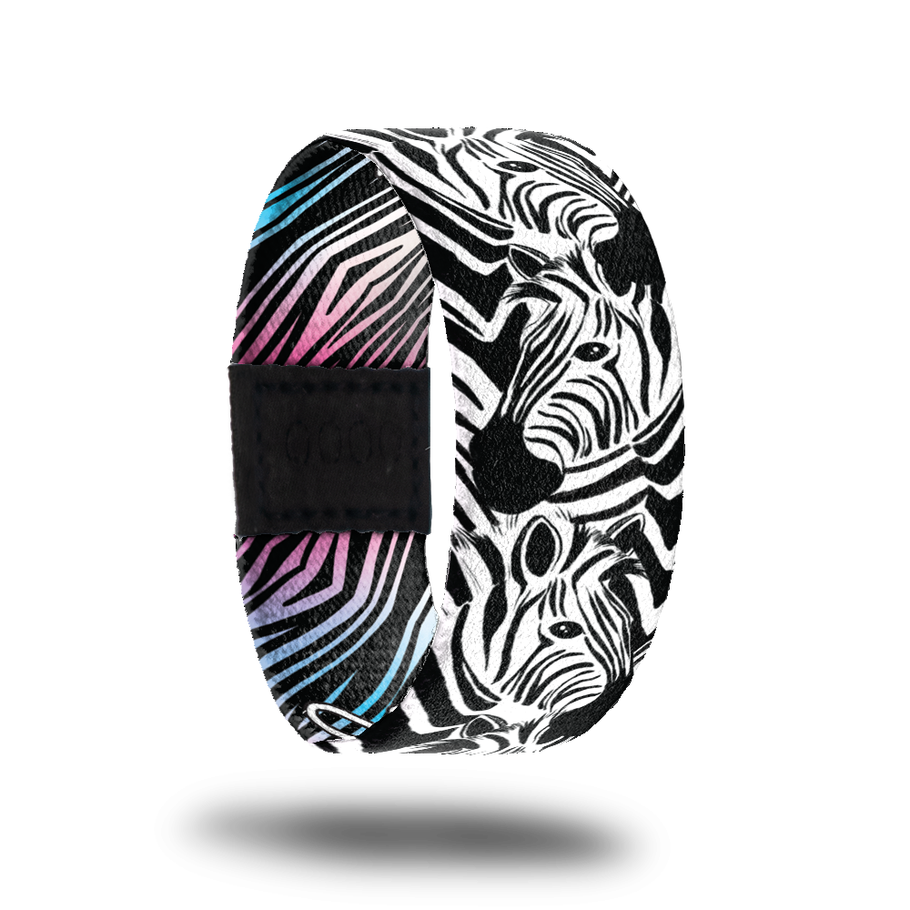 Outside design of Show Your Stripes. Black and white zebra pattern with zebra heads blended in