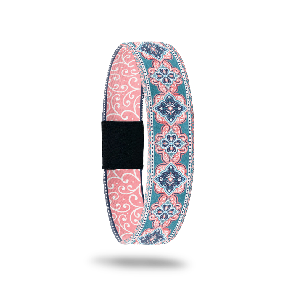 Light pink and muted teal design of Victorian designed mandalas. Inside is pink and white swirls and reads Stay Humble Stay Kind. 