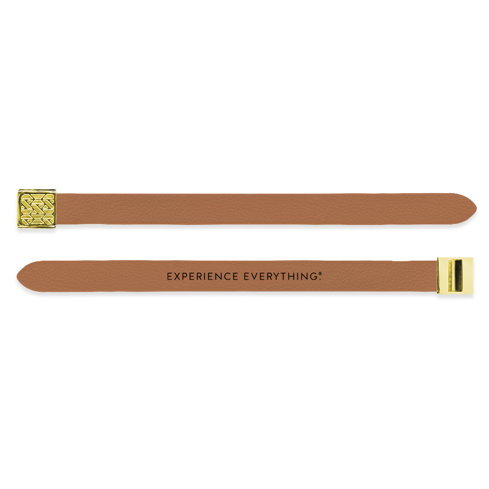 Outside Design of the V2 Imperial Tan Solid: vegan leather material with printed on tan background and gold buckle clasp. And Inside Design of the V2 Imperial Tan Solid: vegan leather material with printed on tan background with black text ‘Experience Everything’ and gold buckle clasp
