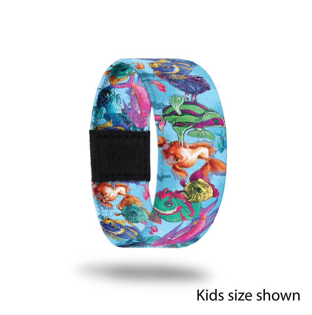 Outside Design of Everyone Is Special (kids size): light blue design with a variety of fish and bubbles along