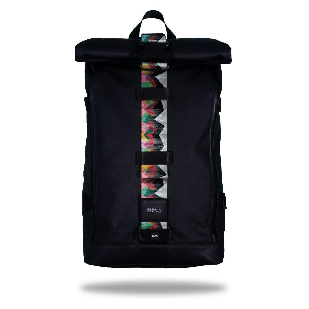 Product image of an Imperial backpack showing a wide strap down the center of it that is interchangeable. The closure strap the item that is for sale on this page and is called Mountains To Molehills and is a geometric mountain range made by triangles in many different colors such as blue, green, orange, and pink