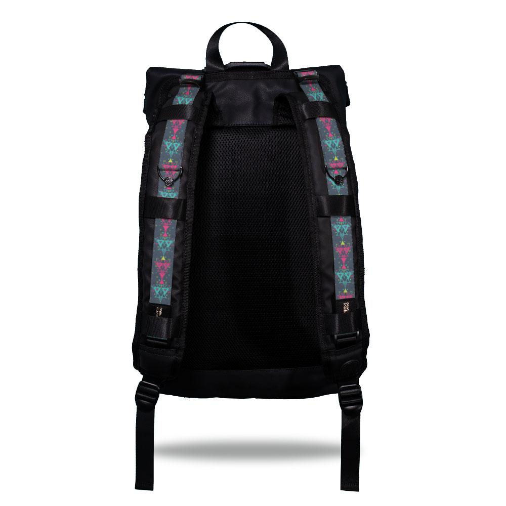 Product image show the back of an Imperial backpack with  two should straps showing with interchangeable straps. The tension strap the item that is for sale on this page and is called Loyal and is a light blue pink, purple, and darker purple geometric design