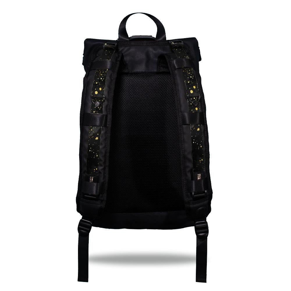 Product image show the back of an Imperial backpack with  two should straps showing with interchangeable straps. The tension strap the item that is for sale on this page and is called Miadas and is mainly solid black and grey in the background with gold colored paint speckles on the front of the design