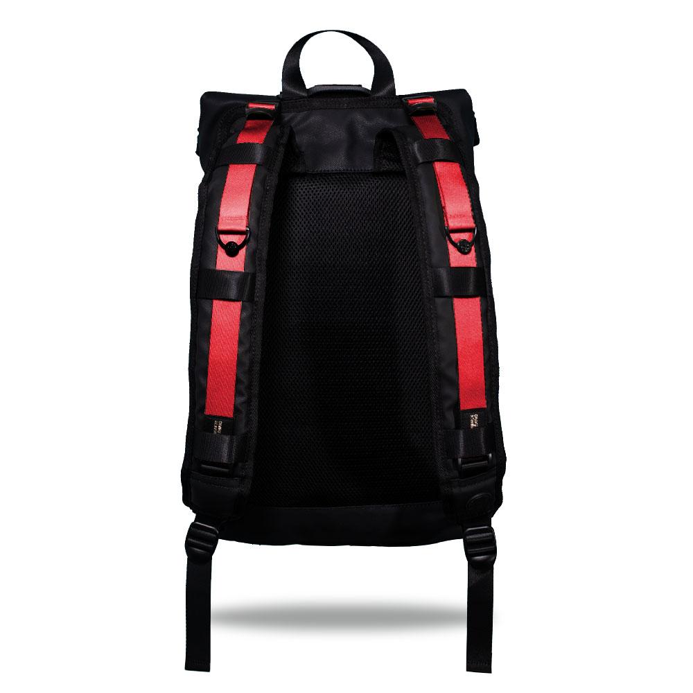 Product image show the back of an Imperial backpack with  two should straps showing with interchangeable straps. The tension strap the item that is for sale on this page and is called Grapefruit and is a solid red orange color