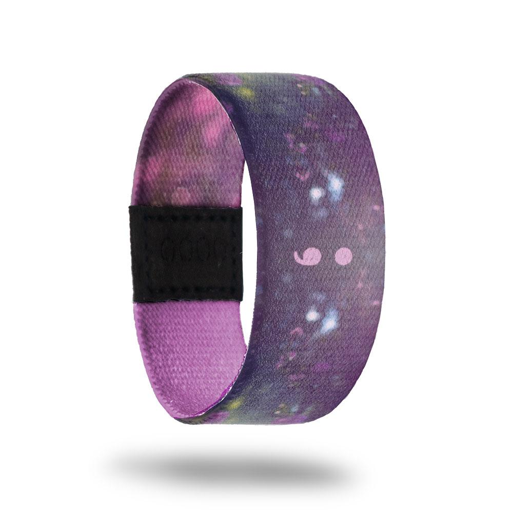 Outside design for Continue: A deep purple dominate background with a glittery bokeh effect and a semicolon at the center.