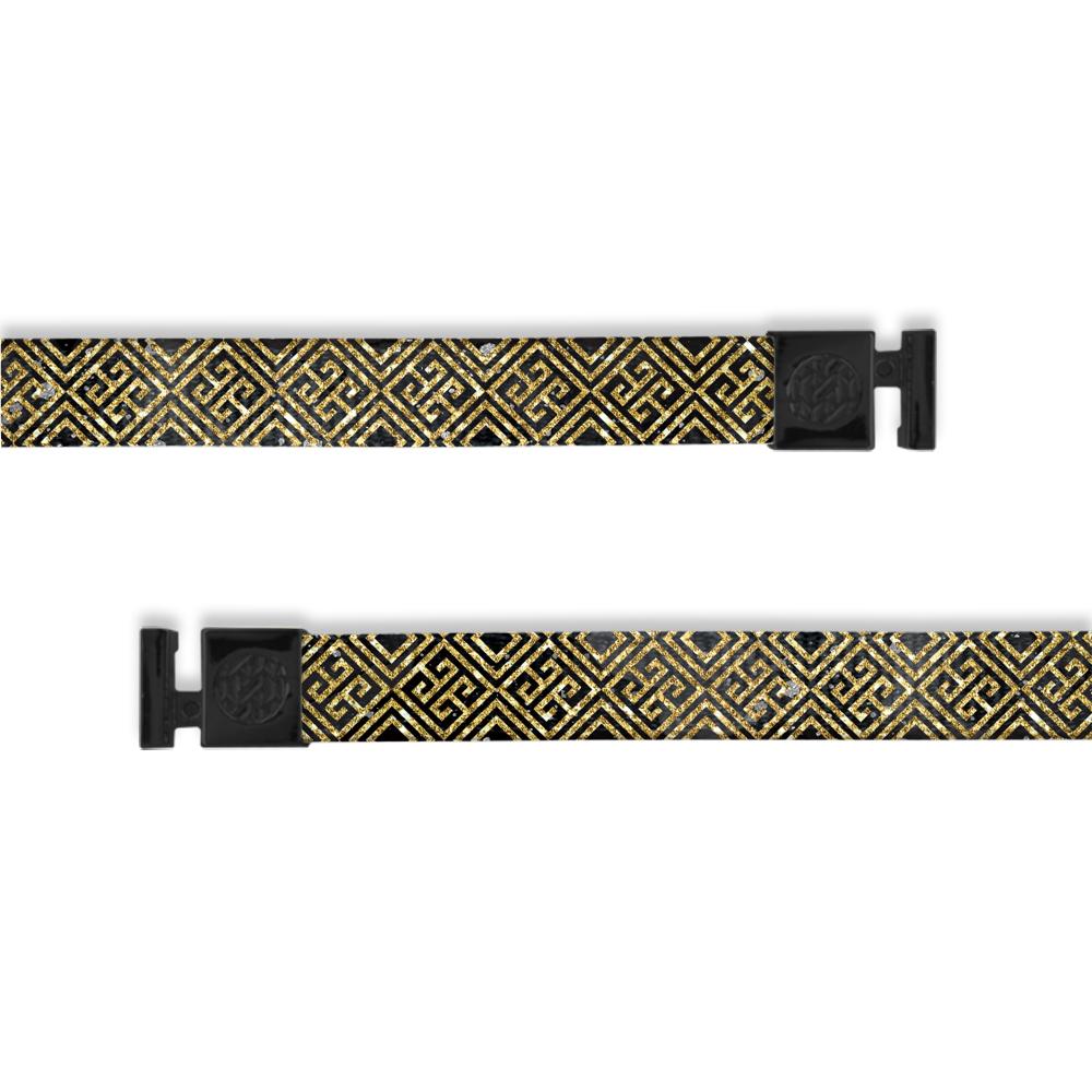 A product image of a wide and flat string with black metal aglets meant to be used with the ZOX hoodie. The string is called Honor and is a black and gold pattern that is repeating throughout the entire string.