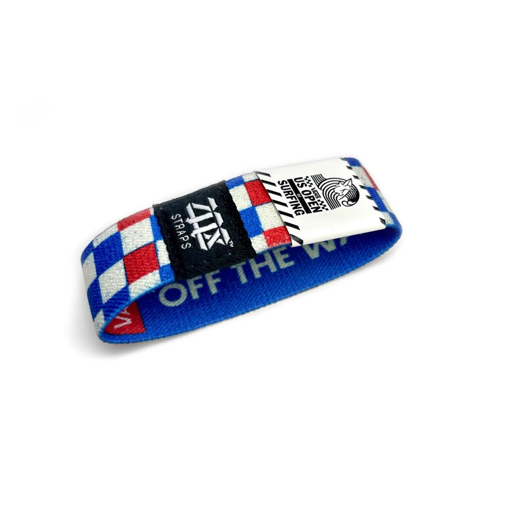 Product photo of the outside of 2013 Vans USOS: checkered red, white, and blue design with white label displaying 'VAN'S US OPEN OF SURFING' text