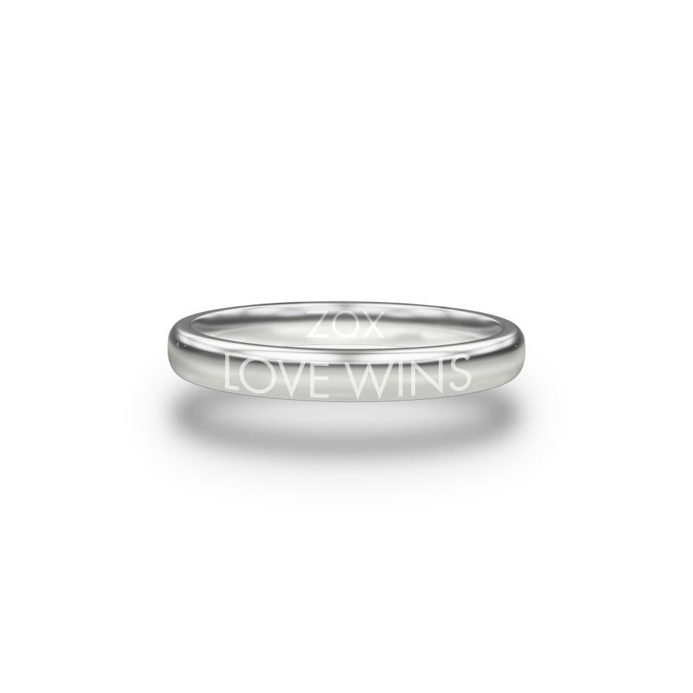 Front design of Love Wins silver ring with sketched in text ‘Love Wins’