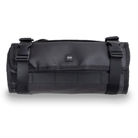 Product image of a roll capsule fully rolled up and buckled. Is great for a variety of items